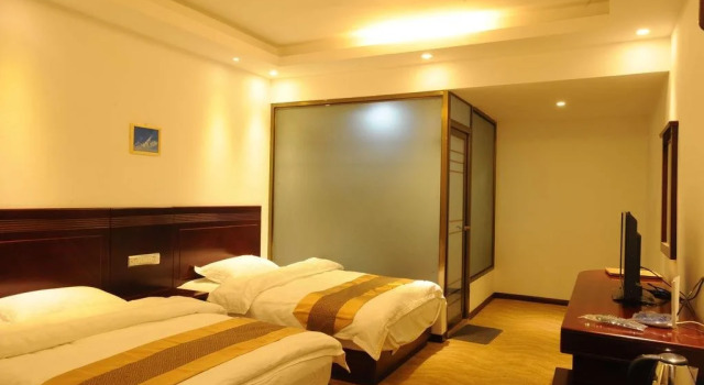 Deqin Zangkangyuan Business Hotel, Reservar Hotel Hotéis e alojamentos em Diqing, Hotel