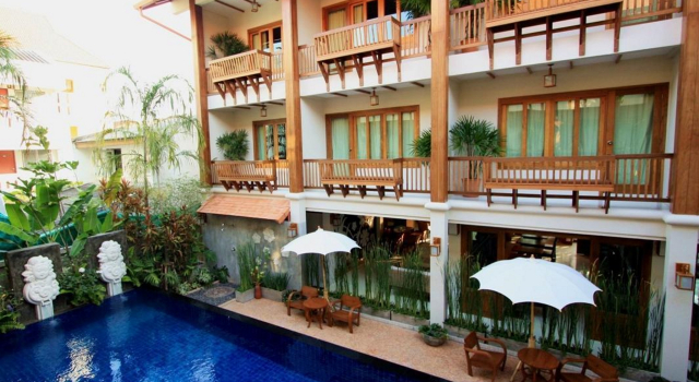 Кровать в общем номере Vieng Mantra Hotel