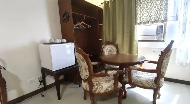 Кровать в общем номере Ferrymar Hotel Iloilo