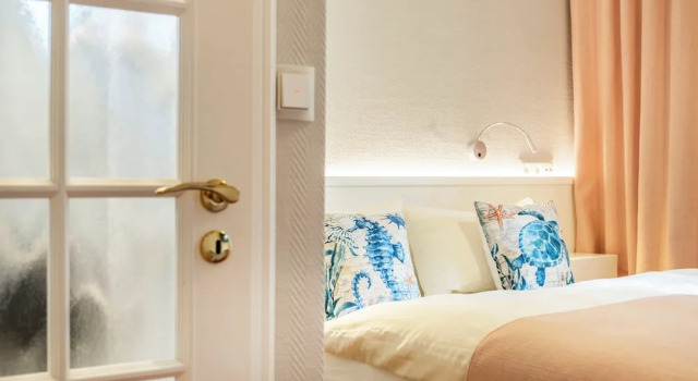 Büngers Apartment-Hotel mit Gartensauna - modern, gemütlich und strandnah
