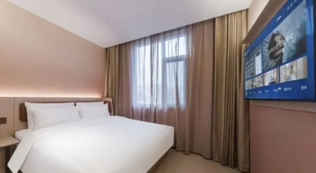 Кровать в общем номере HanTing Hotel (Jinan Zhangzhuang Road Laotun Subway Station Hotel)