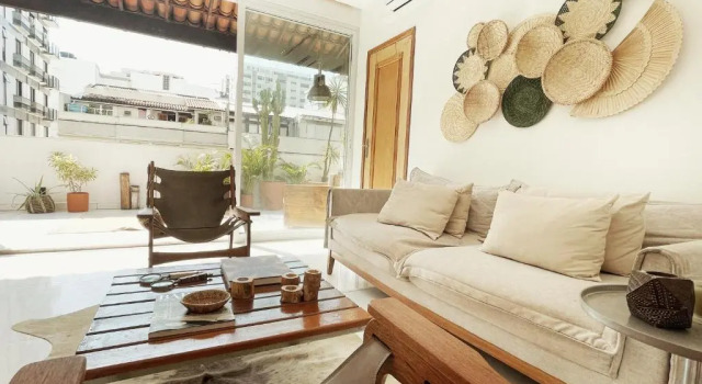 Кровать в общем номере Ipanema Penthouse