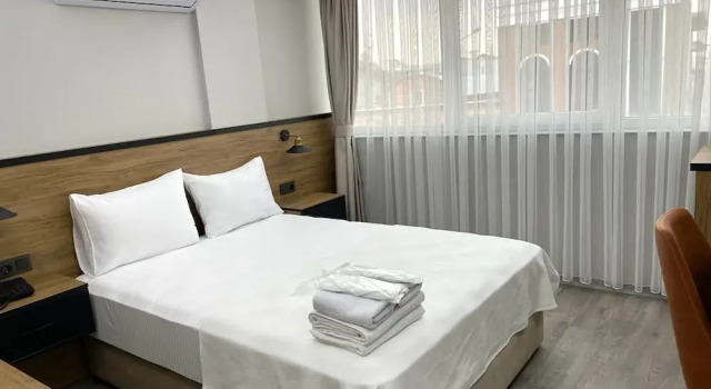 Четырёхместный семейный номер Standard Comfort Center Suit Hotel
