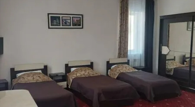 Кровать в общем номере Роял