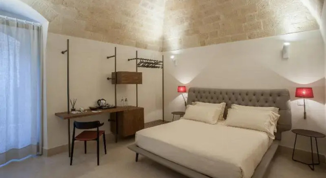 Suite junior con vista a la piscina BV Quarry Matera