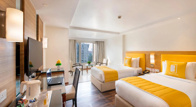 BloomSuites | Ahmedabad, Rezervovat Hotel Hotely v Gujarat s parkováním, Parkování