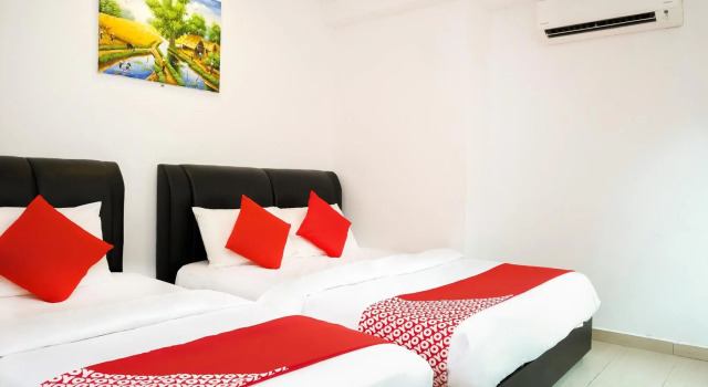 Трёхместный номер Deluxe OYO 718 MR J Hotel Wakaf Che Yeh 1