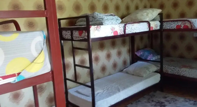 Кровать в общем номере Гостевой дом Lovely home for you