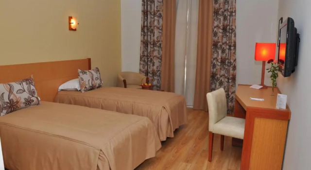 Camera Standard Across Hotels & Spa