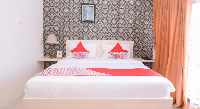 Номер Deluxe Capital O 854 Ub Caisar Hotel