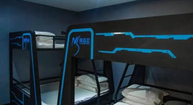 Кровать в общем номере Yan'an Yusen E-sports Hotel