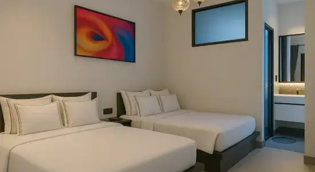 Семейный люкс с балконом LYNs HOTEL
