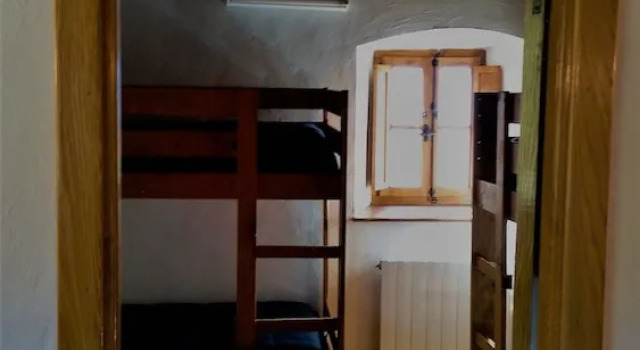 Кровать в общем номере Albergue Rural Mandoia - Hostel
