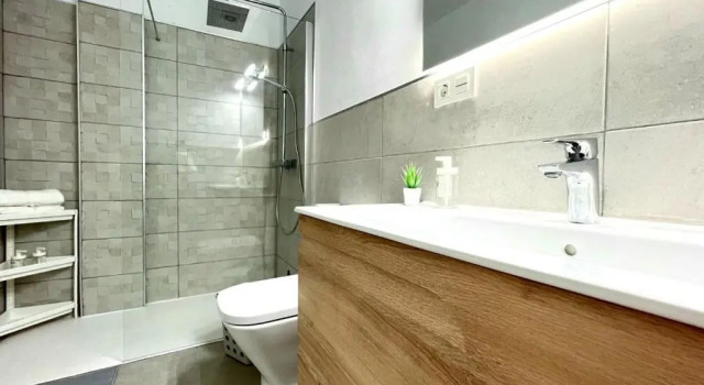 Апартаменты Precioso apartamento con piscina a 50m de la playa