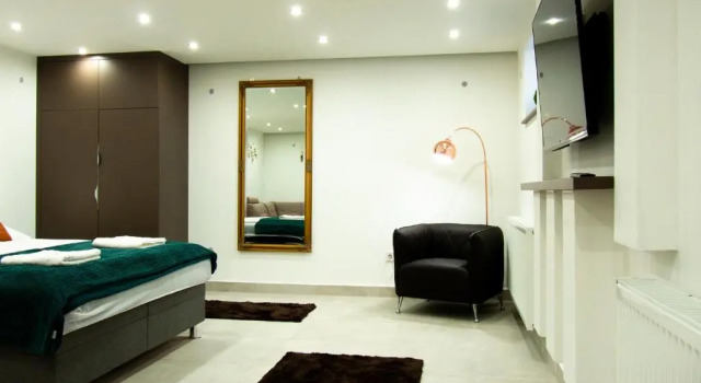 Номер Deluxe Spotlight Apartmanház