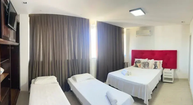Четырёхместный номер Luxury Vila Alaide Praia Hotel