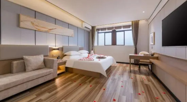 Люкс Business Wanning Wanyi Yujing Hotel (Wanning People's Hospital)