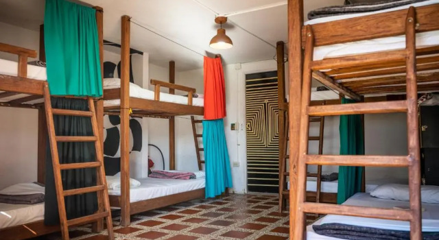 Кровать в общем номере Casa Kayam Hostal y Residencia Artistica