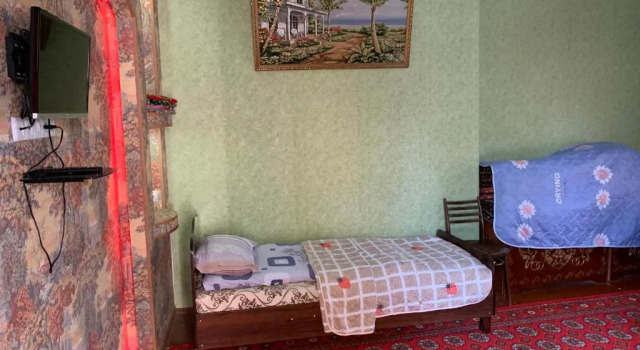 Económica quarto Muharram Homestay in the neighborhood of the Registan Square, 家族 ゲストハウス