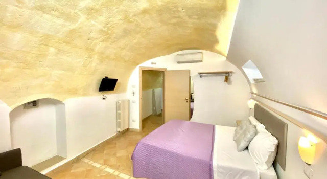 Номер Deluxe Il Sorriso dei Sassi Rooms