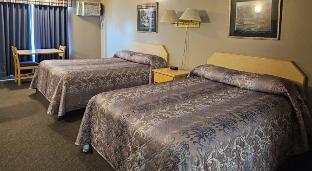 Четырёхместный номер Executive Цокольный этаж Perfect Inns & Suites