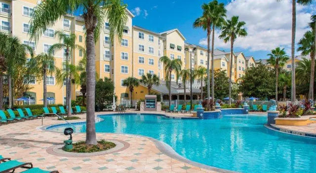 Кровать в общем номере Residence Inn by Marriott Orlando at SeaWorld