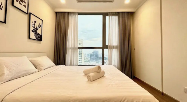 Двухместные апартаменты с балконом и с видом на город Vinhomes Central Park - PHAN DANG Residences