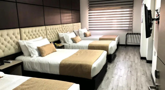 Четырёхместный номер Superior Hotel American Visa Tower