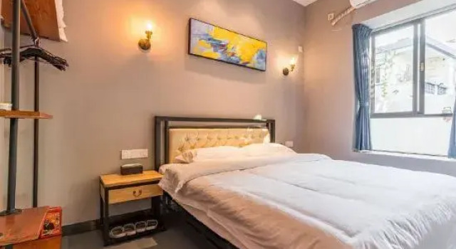 Кровать в общем номере с 6 комнатами Shen Zhen Dapeng Shanhai Yunyu Party and Group Building Villa