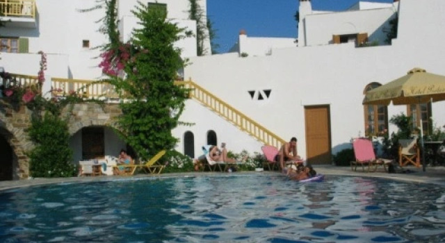 Кровать в общем номере Proteas Hotel & Suites