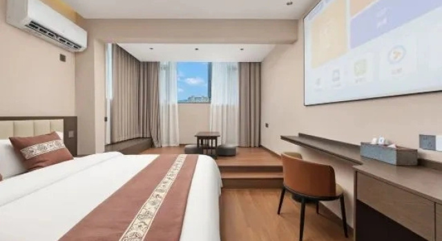 Кровать в общем номере Taoxi Homestay