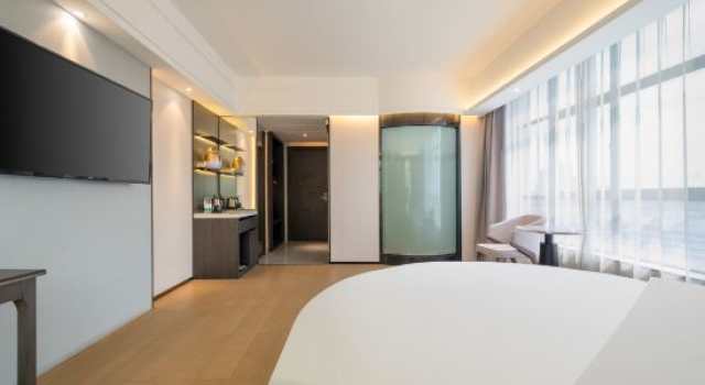 Номер Deluxe Liangde Hotel (Shenzhen Shajing Houting Subway Station)