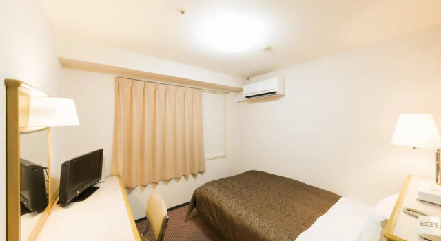 Dai-ni Sunny Stone Hotel, Buchen Sie Hotel Suita Präfektur Ōsaka