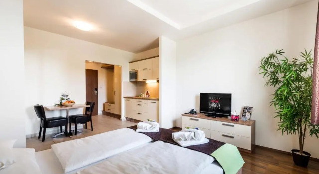 Апартаменты Standard Hotel Garzon Plaza