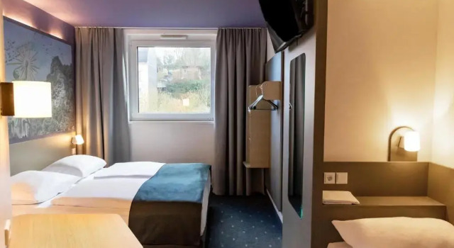 Трёхместный номер B&B HOTEL Idar-Oberstein