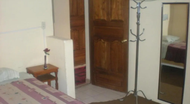 Кровать в общем номере Julia Plaza Hotel