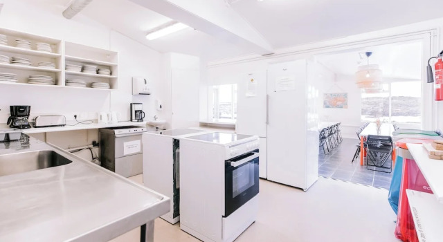 Кровать в общем номере Hlid Cottages