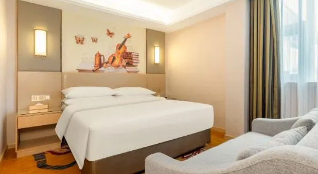 Люкс Vienna International Hotel (Wuxuan Chengbei Road)