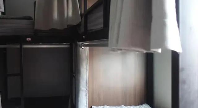 Кровать в общем номере Champa Inn Hotel