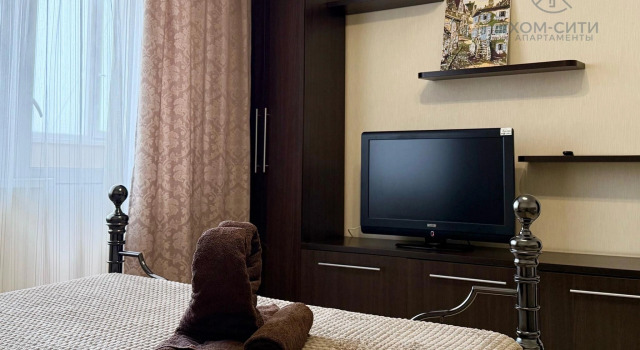Апартаменты Цокольный этаж c 1 комнатой с балконом Home city Central apartments