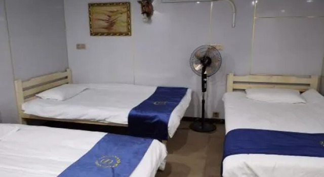 Кровать в общем номере (мужской номер) Shanghai Shuyi Theme Hotel (Yuying Road Subway Station)