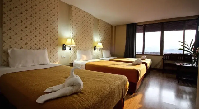 Трёхместный номер Standard с балконом Phornpailin Riverside Resort