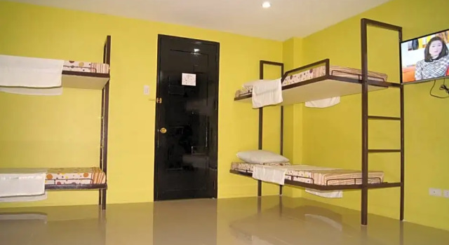 Vuode makuusalissa Staylite Park B&B