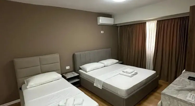 Deluxe Dreier Zimmer Hotel HER