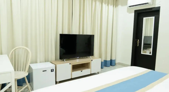 Номер Deluxe Hampton Suites
