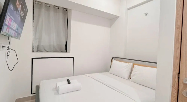 Апартаменты Deluxe Cozy 1BR (No Kitchen) at Bandaraya - Tallasa City Makassar Apartment By Travelio