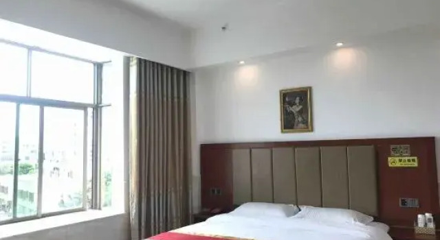 Wanning Jinle Business Hotel, Boek Hotel Wanning Hainan