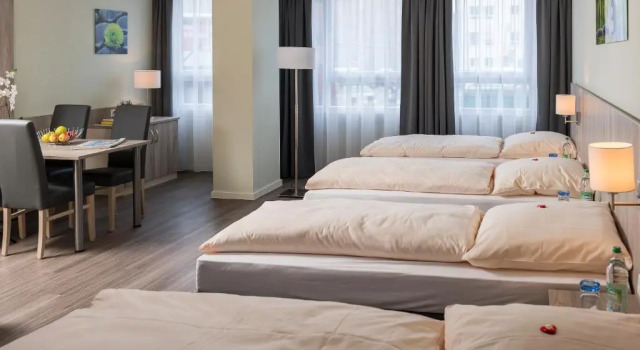 Четырёхместный номер Classic AINO Aparthotel Olympiapark