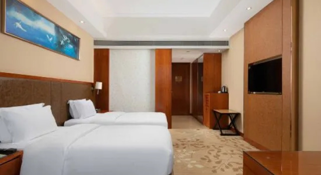 Двухместный номер Deluxe Jiuzhou International Hotel