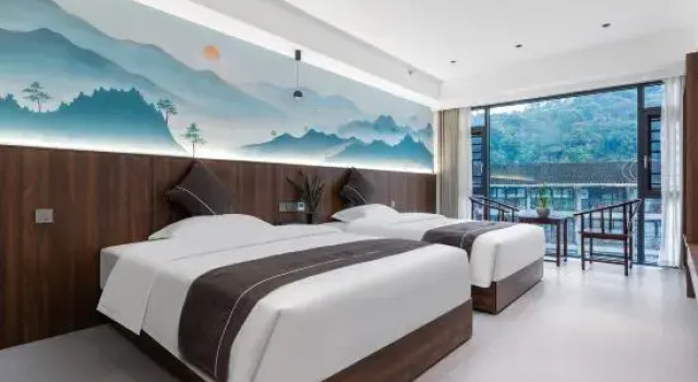 Люкс Xingmeng Qiju Hotel (Fanjing Mountain Scenic Area East Gate)
